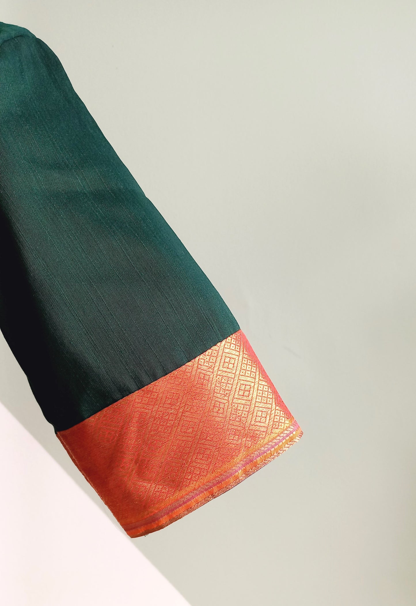 Bottle green Cotton Silk blouse with Kanchi Border