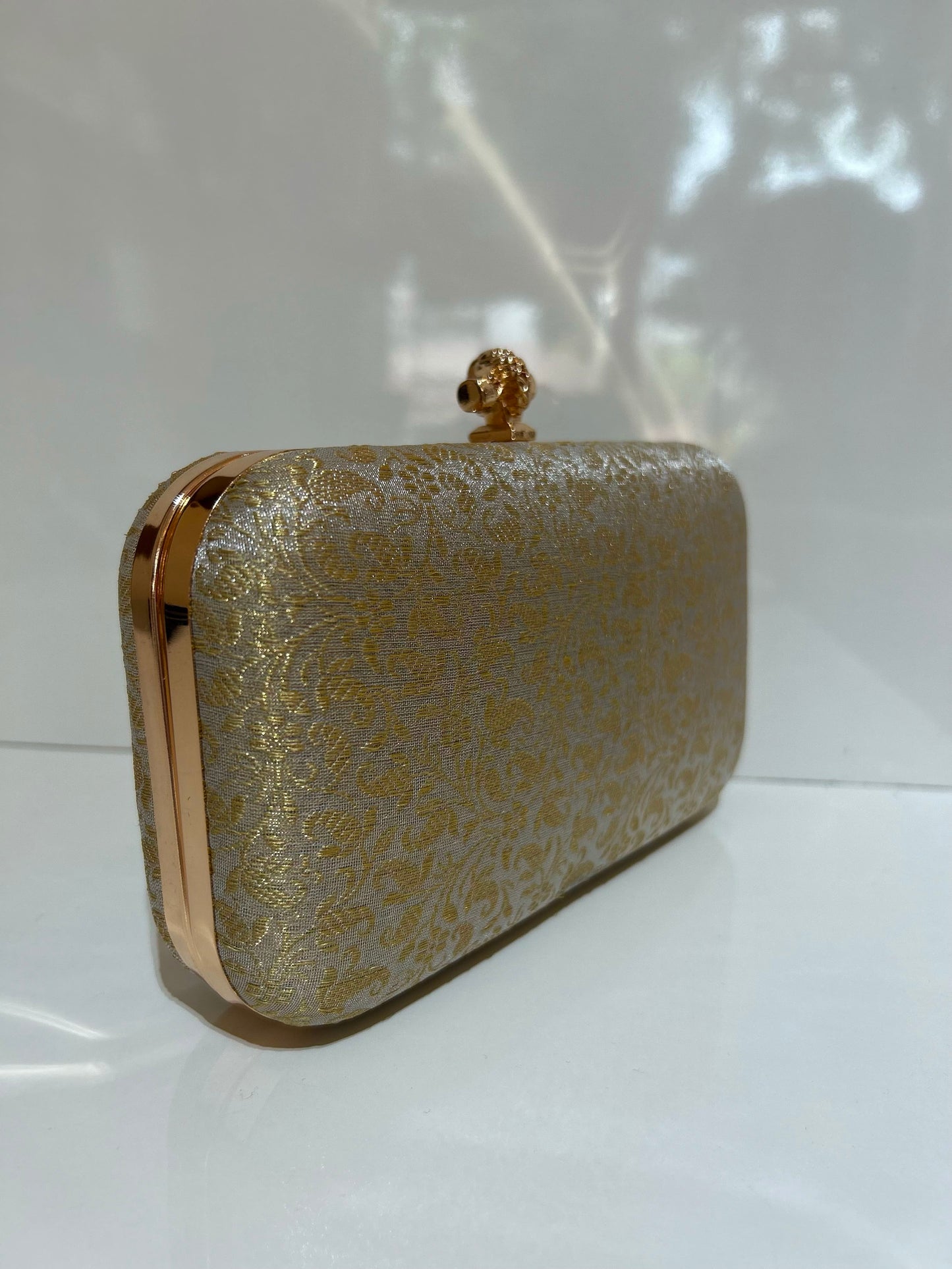 Gold Tissue Clutch